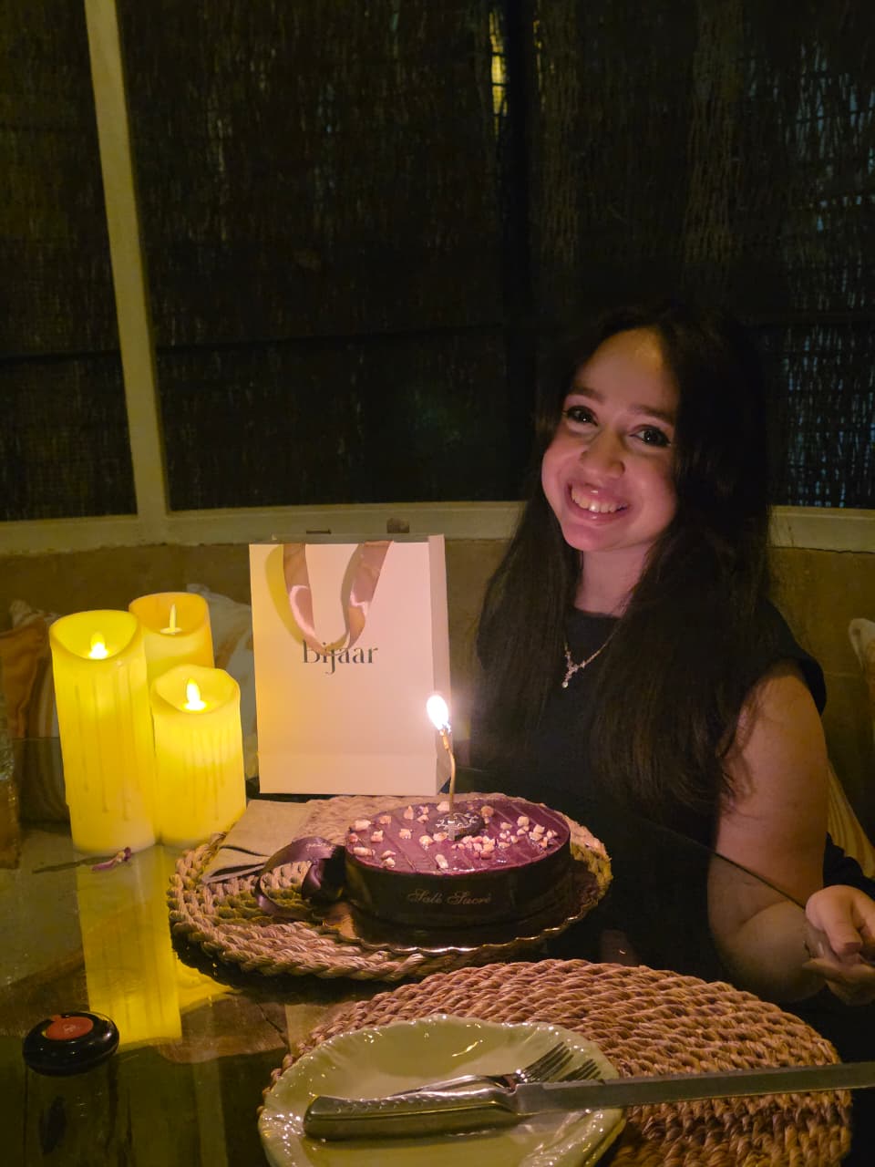 Margaret smiling beside her birthday cake